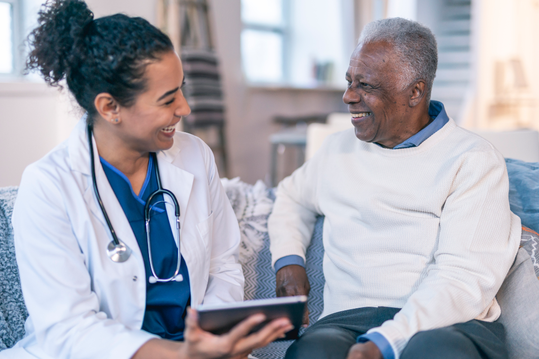 Doctor laughing with man